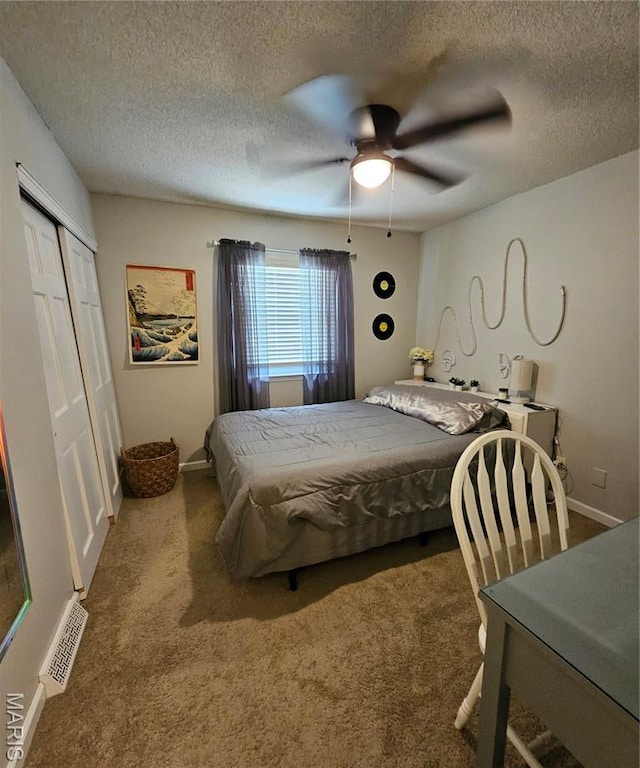 22 Settlers Trl, Hannibal, MO 63401 - bedroom with carpet, a textured ceiling, a closet, and ceiling fan