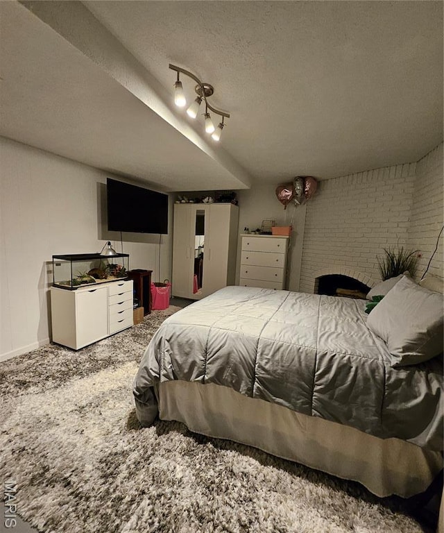 22 Settlers Trl, Hannibal, MO 63401 - bedroom with carpet flooring and a textured ceiling