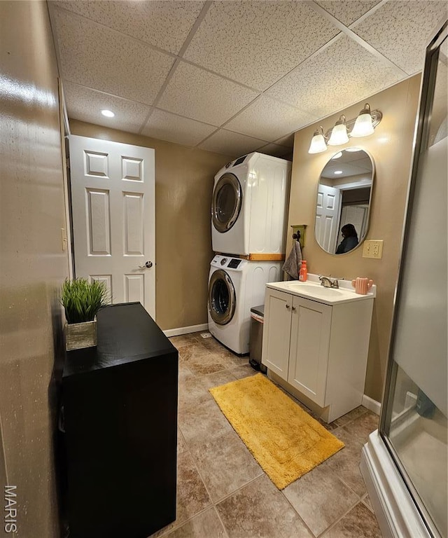 22 Settlers Trl, Hannibal, MO 63401 - laundry room featuring stacked washer / drying machine and recessed lighting