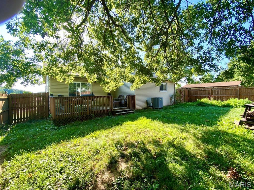 1129 Albers, Bethalto, IL 62010 - fenced backyard featuring a wooden deck
