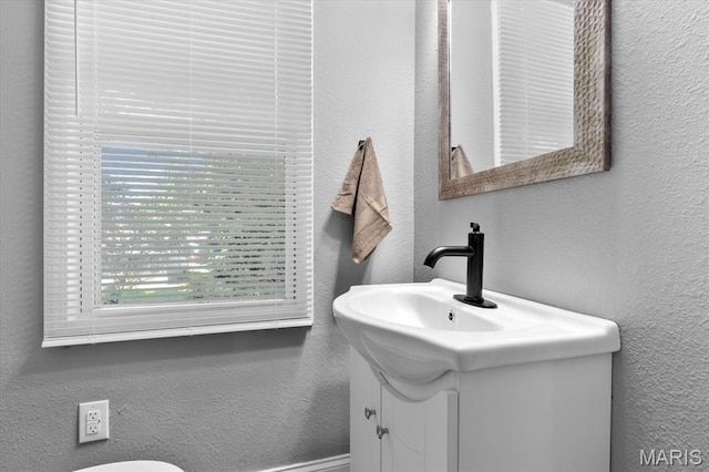 207 N 13th St, Belleville, IL 62220 - bathroom featuring vanity and a textured wall
