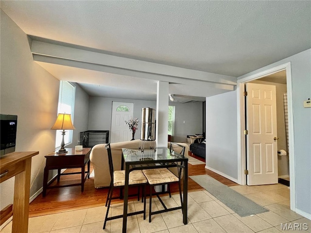100A Wall St, New Haven, MO 63068 - dining room with light tile patterned floors, healthy amount of natural light, and a textured ceiling