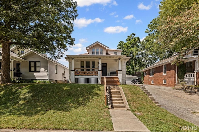 505 Sycamore St, Belleville, IL 62220 - bungalow with stairway, covered porch, and a front yard