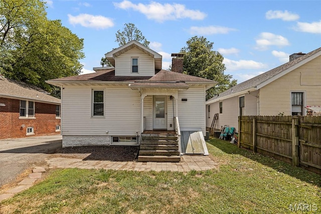 505 Sycamore St, Belleville, IL 62220 - rear view of property featuring entry steps and a chimney