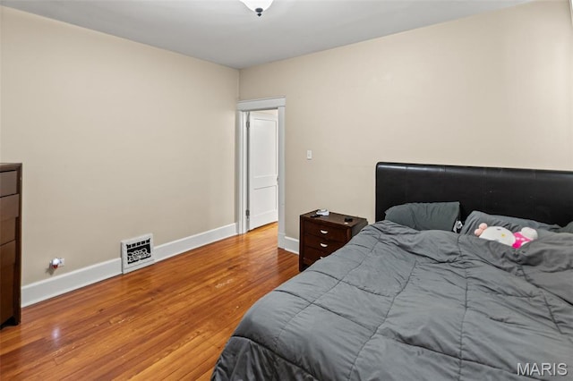 505 Sycamore St, Belleville, IL 62220 - bedroom with wood finished floors and baseboards