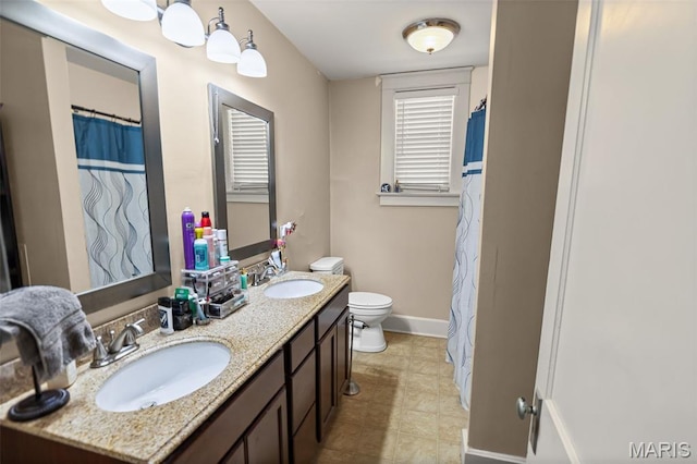 505 Sycamore St, Belleville, IL 62220 - bathroom featuring double vanity and curtained shower