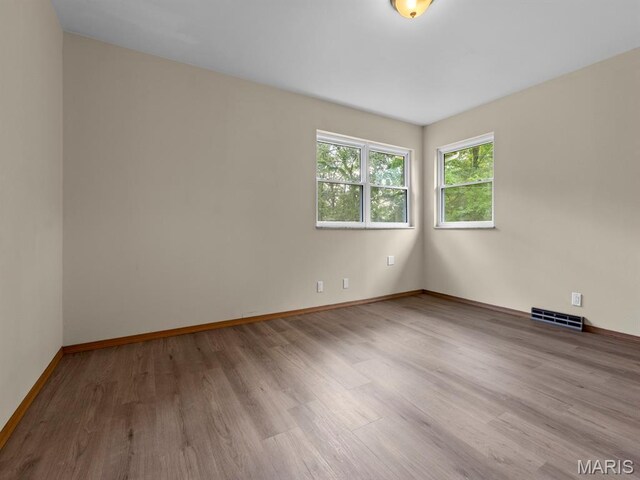 4488 Rock Creek Valley Rd, House Springs, MO 63051 - unfurnished room with wood finished floors and baseboards