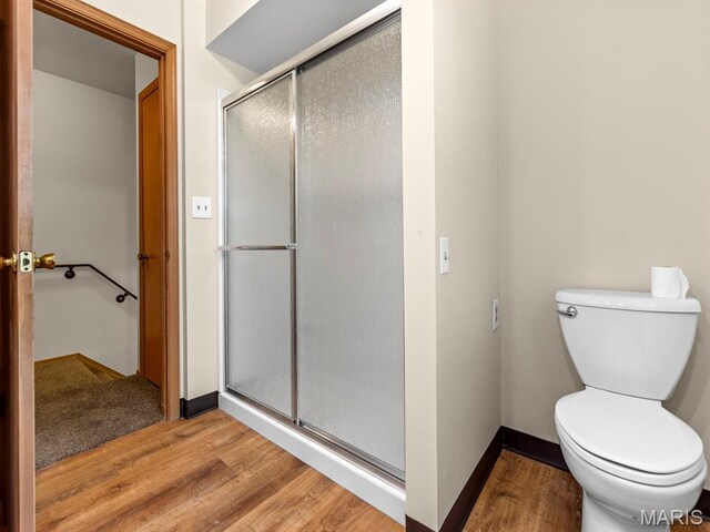 4488 Rock Creek Valley Rd, House Springs, MO 63051 - bathroom featuring a shower stall and wood finished floors