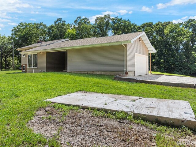 4488 Rock Creek Valley Rd, House Springs, MO 63051 - rear view of property featuring a yard