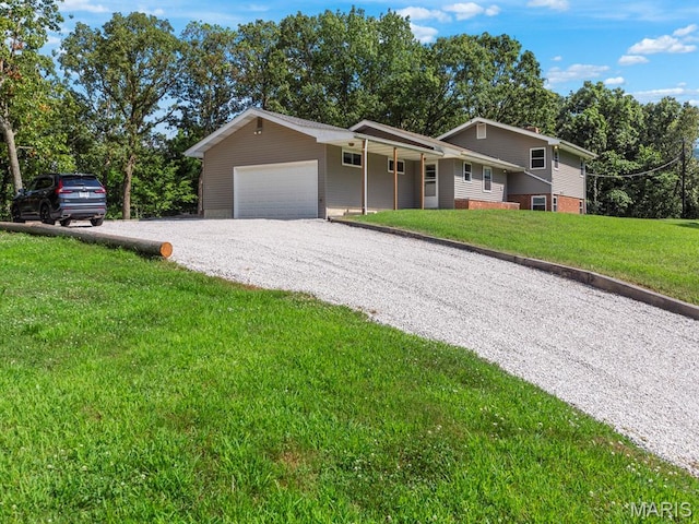 4488 Rock Creek Valley Rd, House Springs, MO 63051 - single story home with an attached garage, gravel driveway, and a front yard
