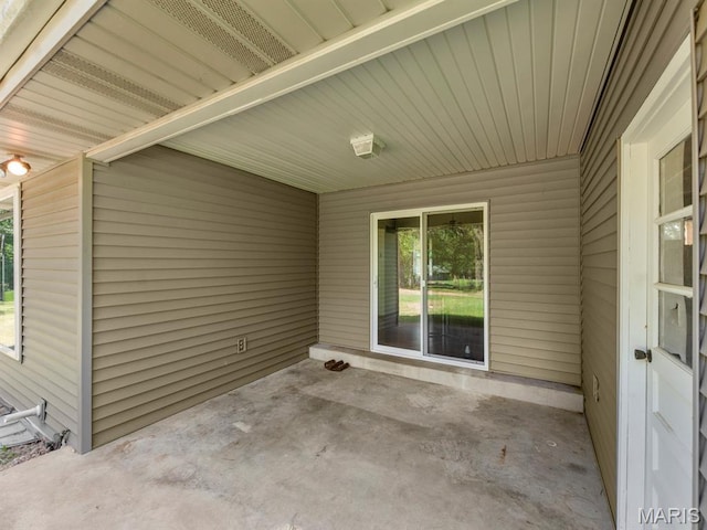 4488 Rock Creek Valley Rd, House Springs, MO 63051 - view of patio with a carport
