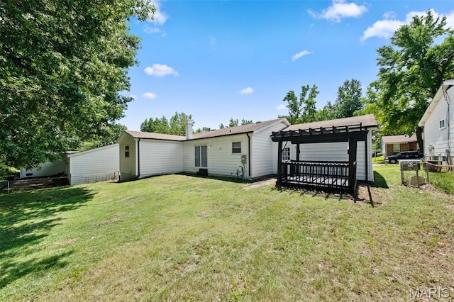 6781 Lesli Mari Ct, Florissant, MO 63033 - back of property with a pergola