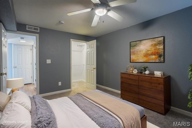1989 Hunting Lake Ct Unit 201, Kirkwood, MO 63122 - bedroom featuring light colored carpet and ceiling fan
