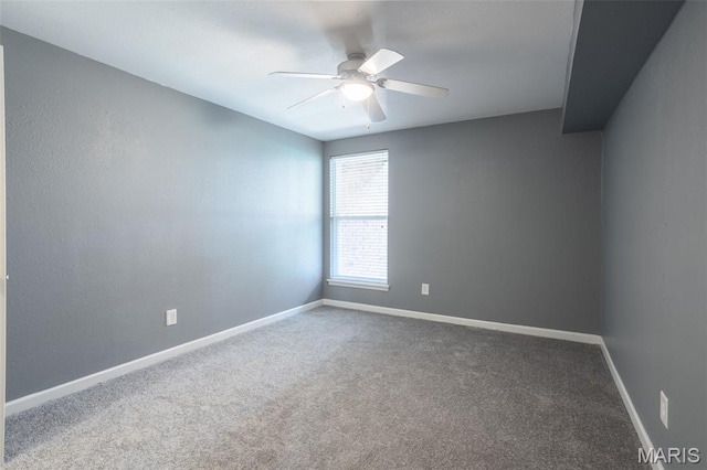 1989 Hunting Lake Ct Unit 201, Kirkwood, MO 63122 - spare room featuring a ceiling fan and carpet flooring