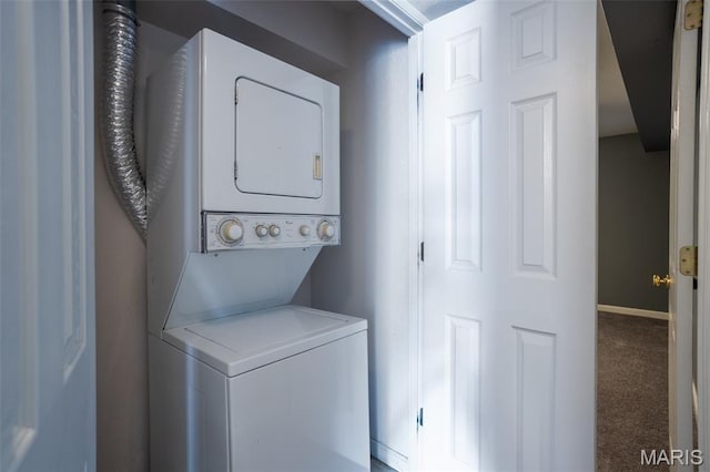 1989 Hunting Lake Ct Unit 201, Kirkwood, MO 63122 - laundry room with stacked washing machine and dryer and carpet