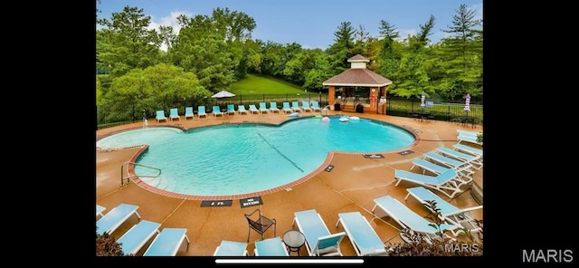 1989 Hunting Lake Ct Unit 201, Kirkwood, MO 63122 - community pool with a gazebo and a patio area