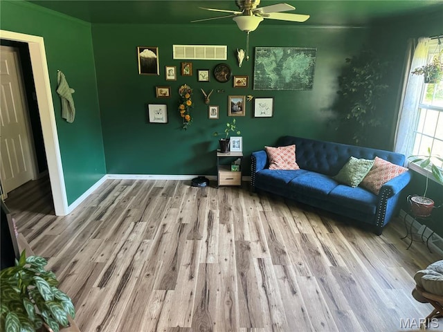 8705 State Road Y, Dittmer, MO 63023 - living area featuring a ceiling fan and wood finished floors