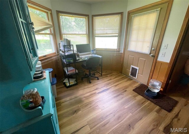 402 N Viola St, Bloomfield, MO 63825 - office area featuring light wood-style floors and wainscoting