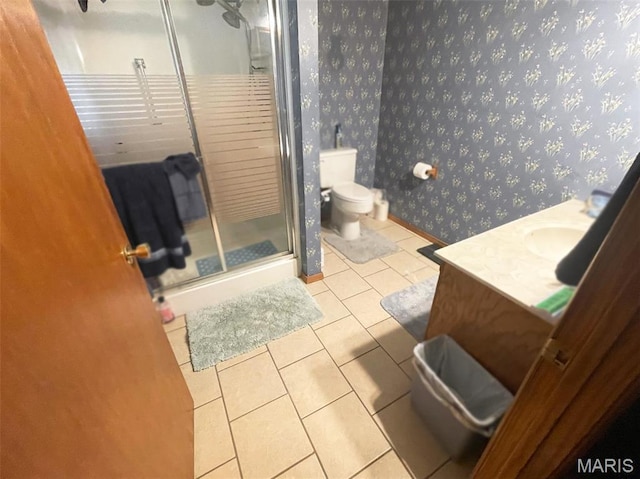 402 N Viola St, Bloomfield, MO 63825 - full bath featuring wallpapered walls, vanity, a shower stall, and tile patterned floors