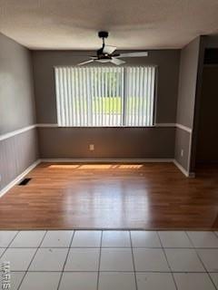 2623 Hord Ave, Jennings, MO 63136 - tiled spare room featuring a ceiling fan and baseboards