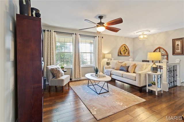 1225 Wissmann Dr, Ballwin, MO 63011 - living area featuring dark wood-type flooring and a ceiling fan