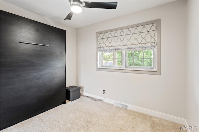 1225 Wissmann Dr, Ballwin, MO 63011 - unfurnished bedroom featuring carpet floors and ceiling fan