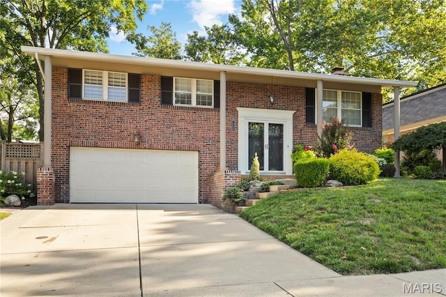1225 Wissmann Dr, Ballwin, MO 63011 - bi-level home featuring concrete driveway, brick siding, and a garage