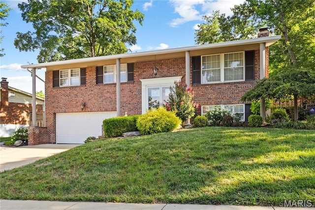 1225 Wissmann Dr, Ballwin, MO 63011 - raised ranch featuring a front lawn, brick siding, and an attached garage