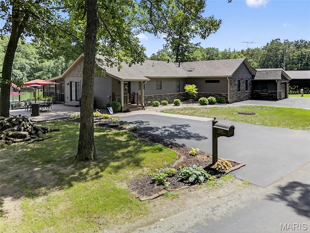 11178 Catatoga Dr, Plainview, IL 62685 - view of front of property with stone siding and a front yard
