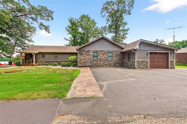 11178 Catatoga Dr, Plainview, IL 62685 - view of front of property with stone siding, asphalt driveway, a garage, and a front lawn