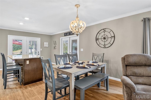11178 Catatoga Dr, Plainview, IL 62685 - dining area featuring a chandelier, light wood-type flooring, crown molding, healthy amount of natural light, and recessed lighting