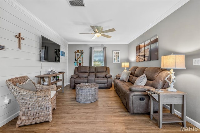 11178 Catatoga Dr, Plainview, IL 62685 - living area with crown molding, ceiling fan, and wood finished floors
