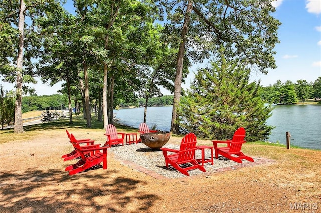 11178 Catatoga Dr, Plainview, IL 62685 - surrounding community featuring an outdoor fire pit and a water view