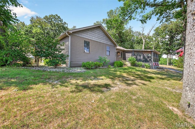 11178 Catatoga Dr, Plainview, IL 62685 - view of side of property with a sunroom and a yard