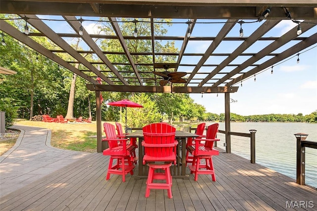 11178 Catatoga Dr, Plainview, IL 62685 - deck featuring a pergola, a water view, and outdoor dining area