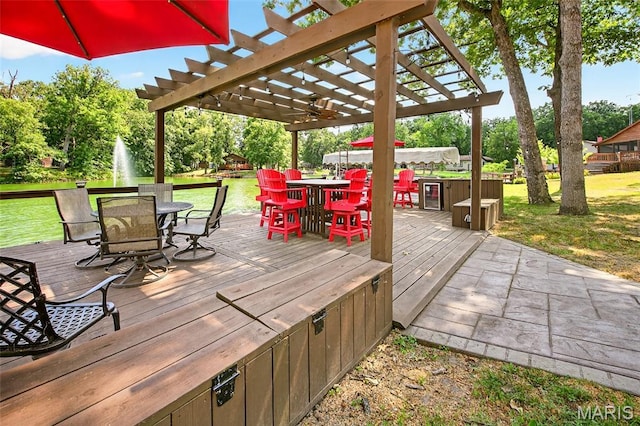 11178 Catatoga Dr, Plainview, IL 62685 - deck featuring outdoor dining area, a pergola, and a yard