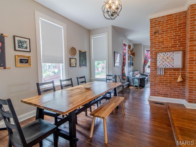 6454 Virginia Ave, Saint Louis, MO 63111 - dining space with plenty of natural light, wood finished floors, and a chandelier