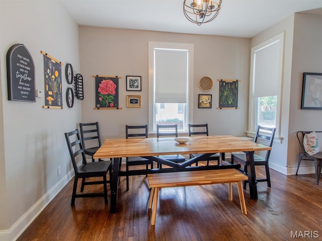 6454 Virginia Ave, Saint Louis, MO 63111 - dining room with dark wood-style floors and a chandelier