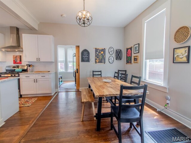 6454 Virginia Ave, Saint Louis, MO 63111 - dining area featuring wood finished floors and baseboards