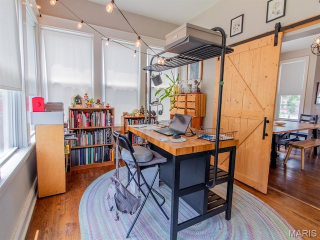 6454 Virginia Ave, Saint Louis, MO 63111 - office area featuring wood finished floors and a barn door