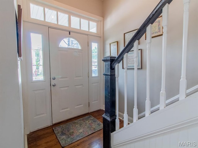 6454 Virginia Ave, Saint Louis, MO 63111 - entrance foyer featuring stairs and wood finished floors