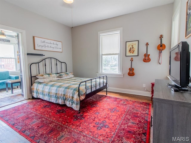 6454 Virginia Ave, Saint Louis, MO 63111 - bedroom featuring wood finished floors and baseboards