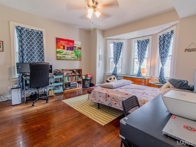 6454 Virginia Ave, Saint Louis, MO 63111 - bedroom featuring hardwood / wood-style floors, an office area, and a ceiling fan
