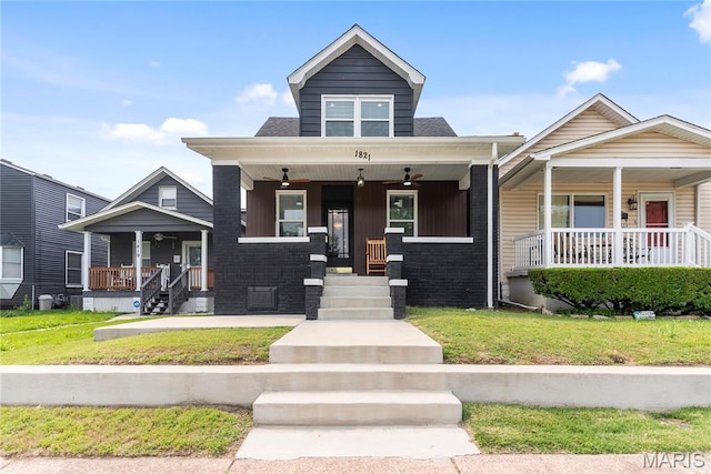 1821 Edwardsville Rd, Madison, IL 62060 - view of front facade with covered porch and a front lawn