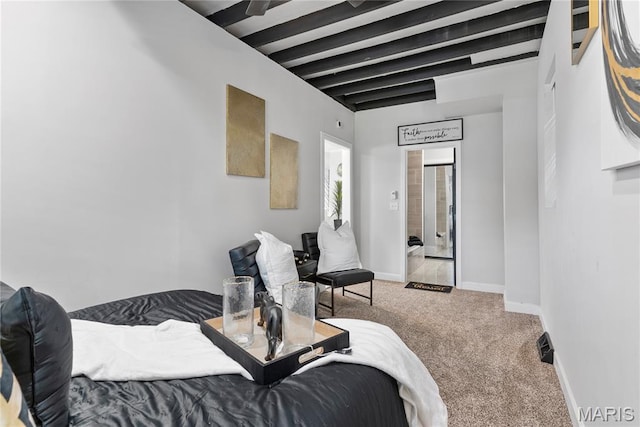 1821 Edwardsville Rd, Madison, IL 62060 - bedroom with carpet flooring and beam ceiling