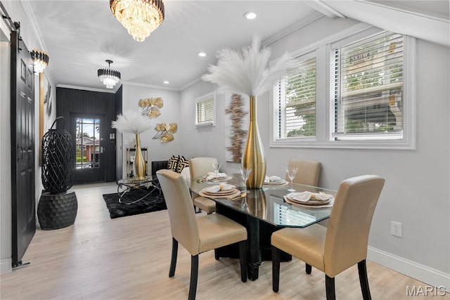 1821 Edwardsville Rd, Madison, IL 62060 - dining space with ornamental molding, plenty of natural light, a chandelier, light wood-type flooring, and recessed lighting
