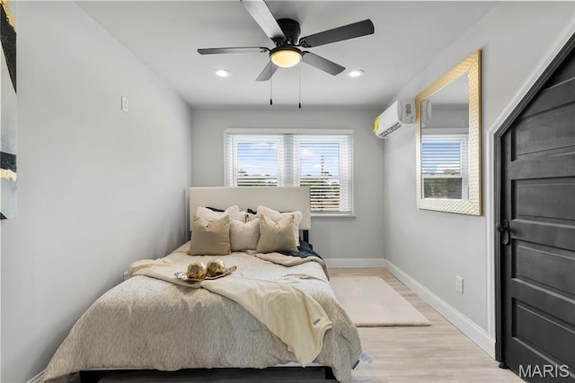 1821 Edwardsville Rd, Madison, IL 62060 - bedroom with a wall mounted air conditioner, light wood-style flooring, recessed lighting, and ceiling fan