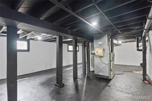 1821 Edwardsville Rd, Madison, IL 62060 - below grade area featuring healthy amount of natural light and heating unit