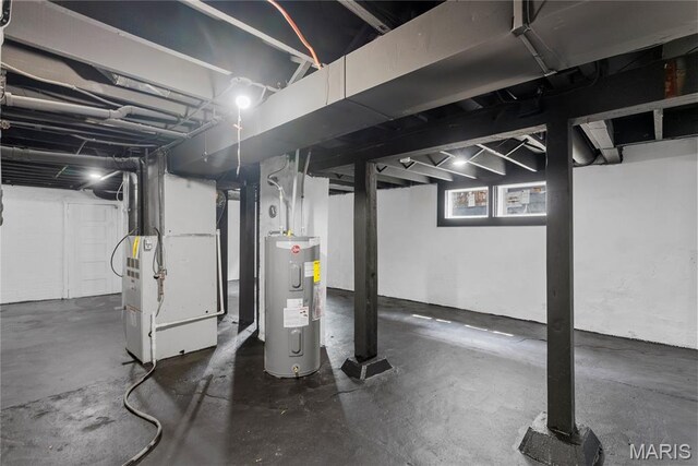 1821 Edwardsville Rd, Madison, IL 62060 - below grade area featuring water heater and heating unit