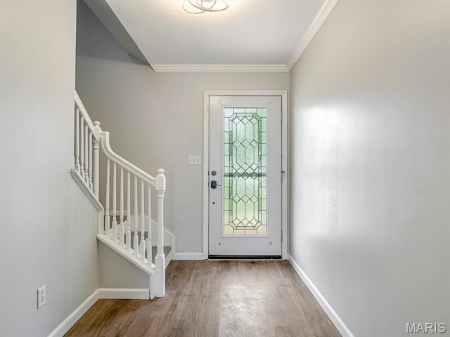 240 Brookmont Dr, Belleville, IL 62221 - entrance foyer featuring wood finished floors, stairs, and crown molding